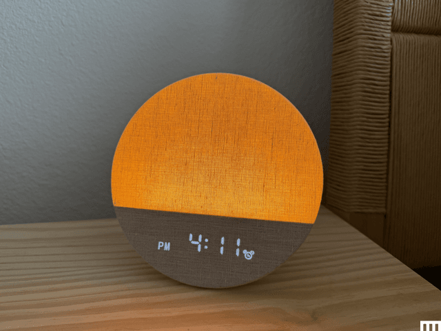 Image may contain Sphere Clock Digital Clock Plywood Wood Ping Pong Ping Pong Paddle Racket and Sport